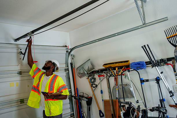 Professional Garage Door Roller Replacement technician working in Henryville, IN